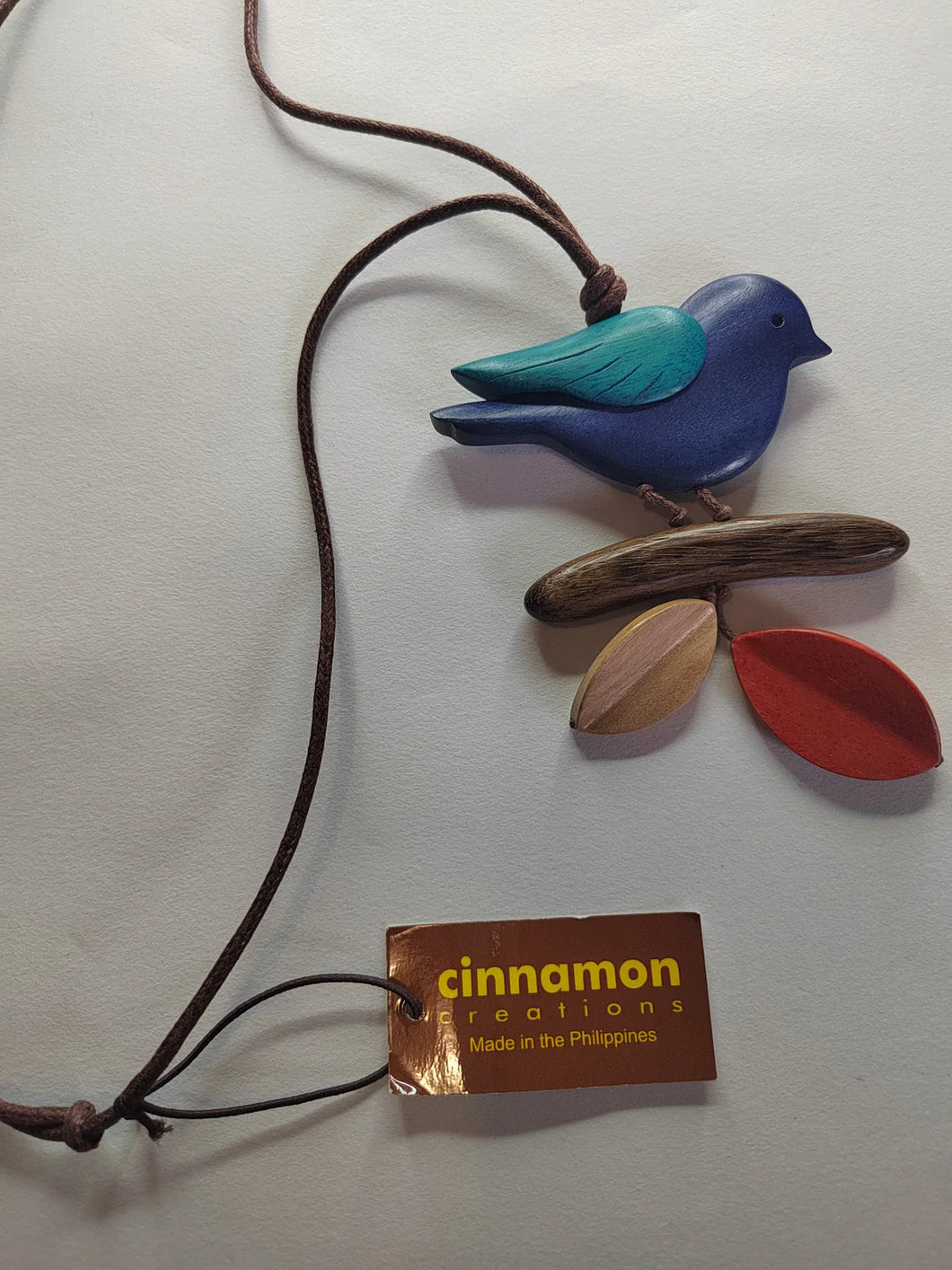 Turquoise wooden bird on a branch necklace adjustable